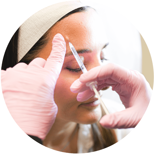 close-up of a woman receiving facial botox injection treatment